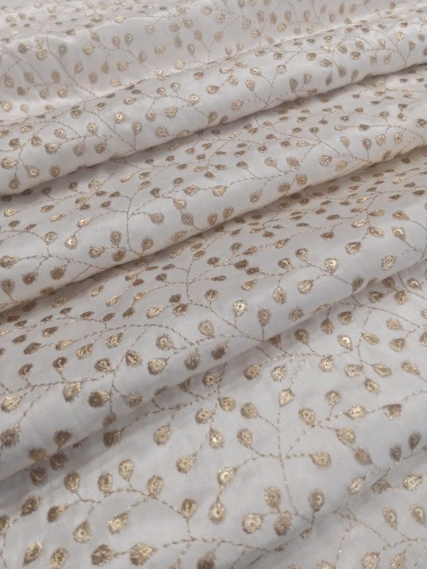 Dyeable Off-White Mashru Silk Fabric with Zari Embroidery, 44-inch width, luxurious handwoven material ideal for creating blouses, lehengas, Kurtis, suits, gowns, and dresses.